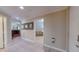 Bright entryway with tile flooring, leading to living room and other rooms at 12055 Gandy N Blvd # 231, St Petersburg, FL 33702