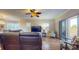 Spacious living room with leather sectional sofa and access to a private balcony at 12055 Gandy N Blvd # 231, St Petersburg, FL 33702