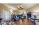 Spacious living room with sectional sofa and hardwood floors at 12055 Gandy N Blvd # 231, St Petersburg, FL 33702
