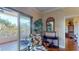 Relaxing living area with comfortable seating and access to balcony at 12055 Gandy N Blvd # 231, St Petersburg, FL 33702