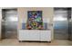Building lobby with elevators and modern decor at 12055 Gandy N Blvd # 231, St Petersburg, FL 33702
