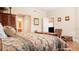 Spacious main bedroom with king bed and hardwood floors at 12055 Gandy N Blvd # 231, St Petersburg, FL 33702