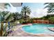 Inviting pool area with lush landscaping at 12055 Gandy N Blvd # 231, St Petersburg, FL 33702