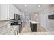 Bright kitchen with stainless steel appliances and granite countertops at 12270 Foxmoor Peak Dr, Riverview, FL 33579