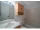 Bathroom with updated vanity, medicine cabinet and tub at 1400 Gandy N Blvd # 715, St Petersburg, FL 33702
