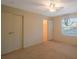 Well-lit bedroom with large closet and ceiling fan at 1400 Gandy N Blvd # 715, St Petersburg, FL 33702