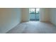 Bedroom with sliding door to balcony at 1400 Gandy N Blvd # 715, St Petersburg, FL 33702