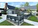 Community clubhouse with outdoor seating and landscaping at 1400 Gandy N Blvd # 715, St Petersburg, FL 33702