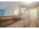 Kitchen with granite counters and stainless steel sink at 1400 Gandy N Blvd # 715, St Petersburg, FL 33702