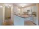 Kitchen with granite counters and white cabinets at 1400 Gandy N Blvd # 715, St Petersburg, FL 33702