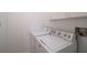 Laundry area with washer and dryer included in unit at 1400 Gandy N Blvd # 715, St Petersburg, FL 33702