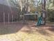 Playground with swings, slide, and monkey bars at 1400 Gandy N Blvd # 715, St Petersburg, FL 33702