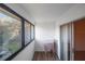 Sunroom with access to another room and a small table at 1400 Gandy N Blvd # 715, St Petersburg, FL 33702