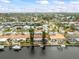 Wide aerial view of waterfront home and neighborhood at 1409 Ne 49Th Ne Ave, St Petersburg, FL 33703