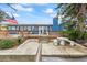 Backyard deck with water view and American flag at 1409 Ne 49Th Ne Ave, St Petersburg, FL 33703