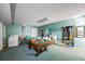Basement with pool table and laundry area at 1409 Ne 49Th Ne Ave, St Petersburg, FL 33703