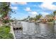 Scenic view of a canal with boats and waterfront homes at 1409 Ne 49Th Ne Ave, St Petersburg, FL 33703
