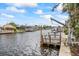 Private dock with boat lift, offering convenient water access at 1409 Ne 49Th Ne Ave, St Petersburg, FL 33703
