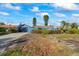 House exterior with damaged landscaping at 1409 Ne 49Th Ne Ave, St Petersburg, FL 33703