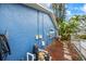 House exterior showcasing blue siding and side yard at 1409 Ne 49Th Ne Ave, St Petersburg, FL 33703