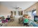 Living room with built-in shelving and lots of items at 1409 Ne 49Th Ne Ave, St Petersburg, FL 33703