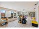 Sunroom with water views and tiled floor at 1409 Ne 49Th Ne Ave, St Petersburg, FL 33703