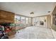 Sunroom with fireplace and access to deck at 1409 Ne 49Th Ne Ave, St Petersburg, FL 33703
