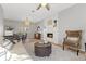 Living room with fireplace and adjacent dining area at 1410 Poinsettia Ave, Tarpon Springs, FL 34689