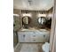 Elegant bathroom with double vanity and a large walk-in shower at 2270 Citrus Ct, Clearwater, FL 33763