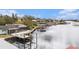 Aerial view of waterfront home with private dock and boat lift at 301 N Spring Blvd, Tarpon Springs, FL 34689