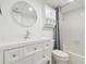 Clean bathroom with white vanity, bathtub and shower at 4715 Michael Ct # 136, Tampa, FL 33614