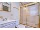 Bathroom with shower/tub and white vanity at 4961 Britni Way, Zephyrhills, FL 33541