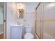 Small bathroom with shower/tub and white vanity at 4961 Britni Way, Zephyrhills, FL 33541