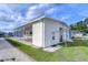 Single story home with covered patio and carport at 4961 Britni Way, Zephyrhills, FL 33541
