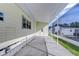 Covered patio with additional covered walkway at 4961 Britni Way, Zephyrhills, FL 33541