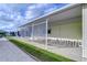 Covered patio with additional covered walkway at 4961 Britni Way, Zephyrhills, FL 33541