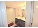 Updated bathroom with modern vanity, fixtures, and a shower/tub combo at 920 Virginia St # 204, Dunedin, FL 34698