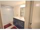 Updated bathroom with modern vanity, fixtures, and a shower/tub combo at 920 Virginia St # 204, Dunedin, FL 34698