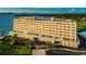 Modern condominium building with waterfront views and convenient parking at 100 Bluff View Dr # 207C, Belleair Bluffs, FL 33770