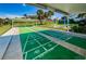 Shuffleboard court under a covered area at 100 Bluff View Dr # 207C, Belleair Bluffs, FL 33770