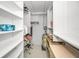 Spacious walk-in closet providing ample storage and organization at 100 Bluff View Dr # 207C, Belleair Bluffs, FL 33770