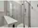 Clean bathroom with walk-in shower and glass enclosure at 10058 Shoreline View Way, Wesley Chapel, FL 33545