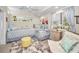 Small bedroom with twin beds and plenty of natural light at 1012 Osprey Ct, Tarpon Springs, FL 34689