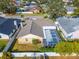 Aerial view of a house with a pool and screened enclosure at 12006 Stone Crossing Circle, Tampa, FL 33635