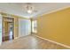 Bright bedroom with tile floors and ceiling fan at 12006 Stone Crossing Circle, Tampa, FL 33635