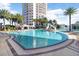 Inviting swimming pool with steps and surrounding patio at 1209 E Cumberland Ave # 805, Tampa, FL 33602