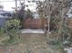 Backyard with a small cement patio and wooden fence at 1644 24Th N Ave, St Petersburg, FL 33713