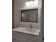 Bright bathroom with updated vanity and a large mirror at 1644 24Th N Ave, St Petersburg, FL 33713
