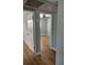 Open door revealing a bedroom with light-blue walls at 1644 24Th N Ave, St Petersburg, FL 33713