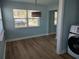 Bright dining area with new flooring and a modern light fixture at 1644 24Th N Ave, St Petersburg, FL 33713